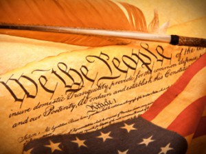 U.S. Constitution with U.S. Flag
